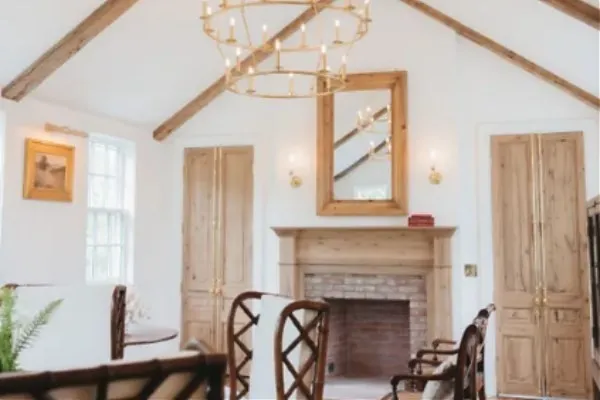 a view of a livingroom with furniture and a fireplace