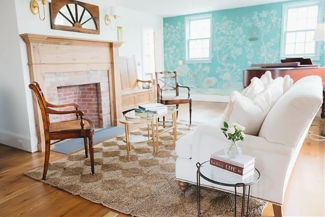 3 Wauwinet Road Nantucket, MA 02554 - Photo 8 of 32 a living room with furniture a fireplace and a table