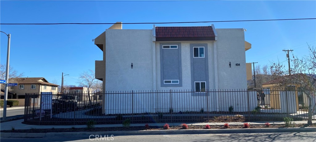 454 East Ave Q3, Unit 5 Palmdale, CA 93550 - Photo 1 of 10 a building view with a outdoor space