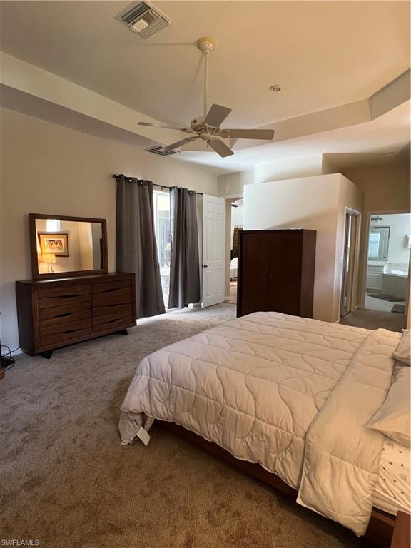 7896 Founders Circle Naples, FL 34104 - Photo 11 of 18 a bedroom with bed and window