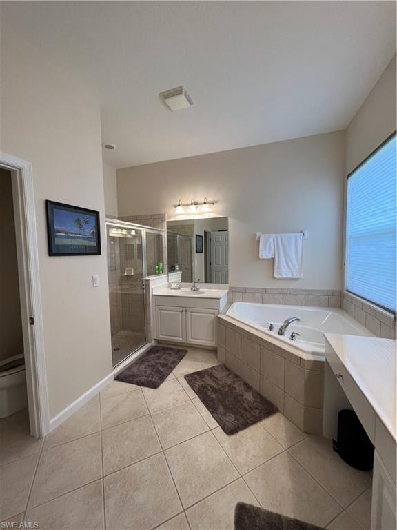 7896 Founders Circle Naples, FL 34104 - Photo 12 of 18 a kitchen with a cabinets and white appliances