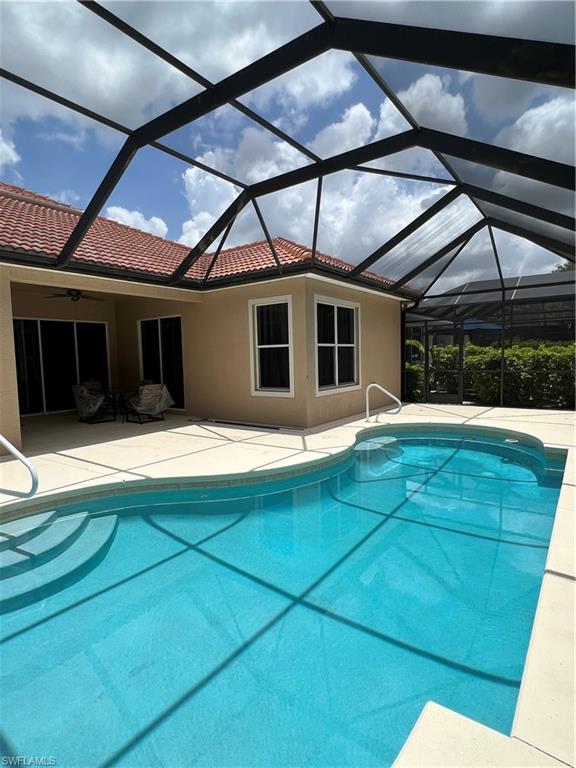7896 Founders Circle Naples, FL 34104 - Photo 18 of 18 a view of a house with a backyard