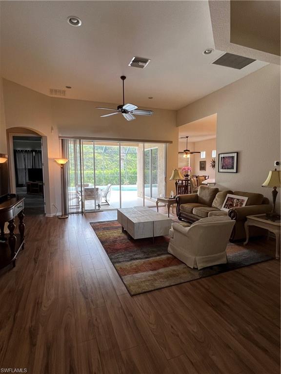 7896 Founders Circle Naples, FL 34104 - Photo 3 of 18 a living room with furniture and large windows