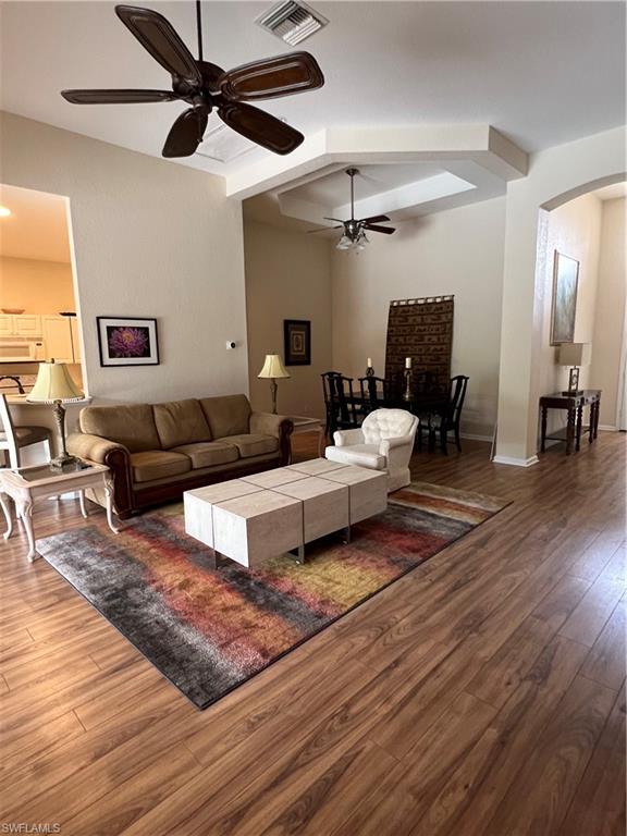 7896 Founders Circle Naples, FL 34104 - Photo 4 of 18 a living room with furniture and a wooden floor