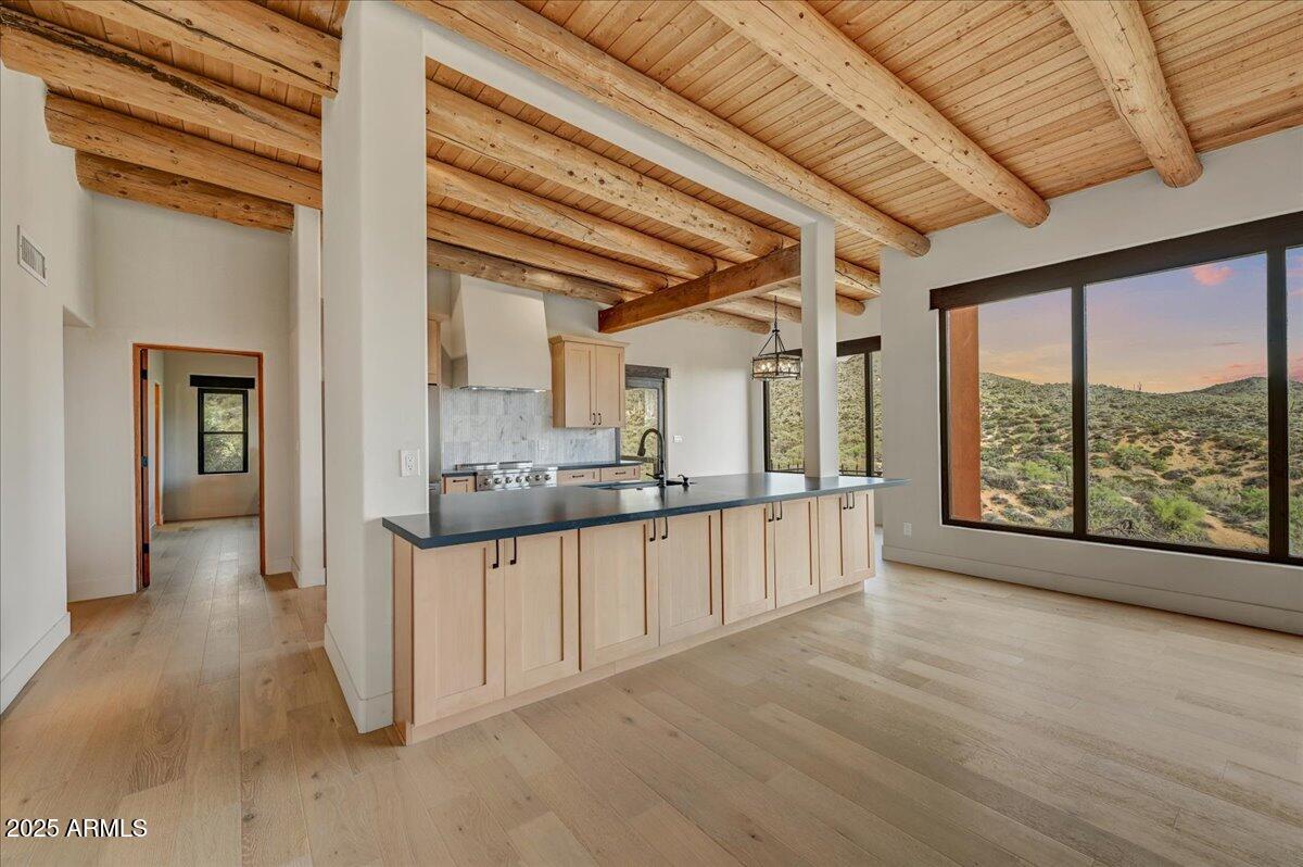 11702 East Blue Wash Road Scottsdale, AZ 85262 - Photo 14 of 50 a view of a kitchen with a sink and a large window