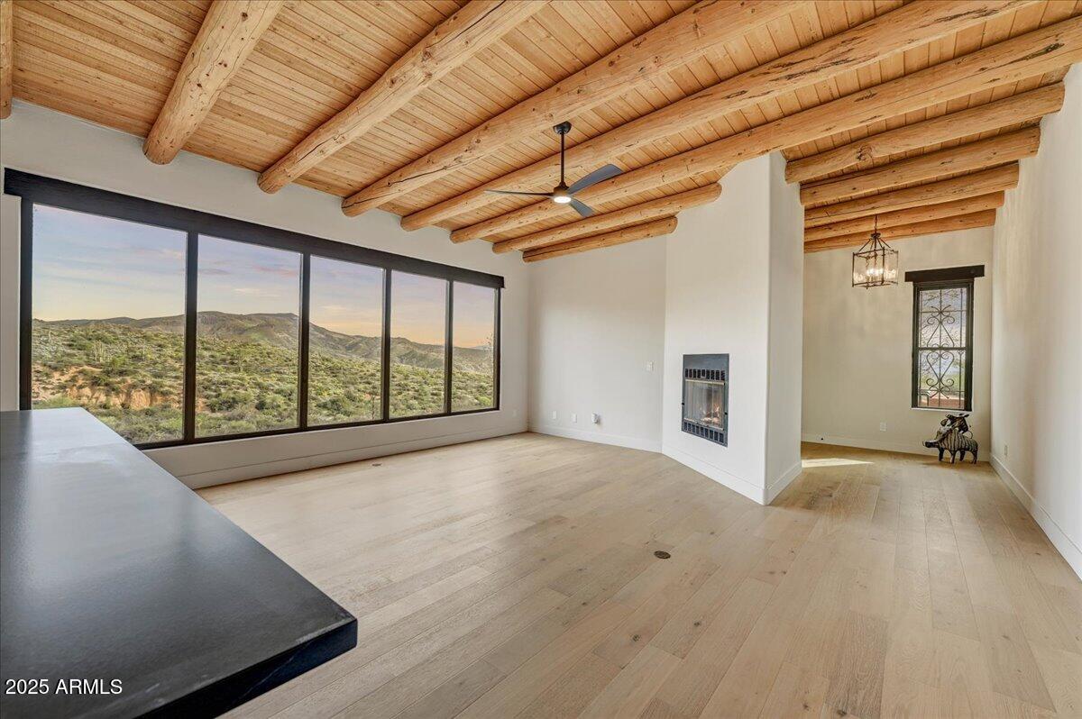 11702 East Blue Wash Road Scottsdale, AZ 85262 - Photo 2 of 50 a view of an empty room with a window