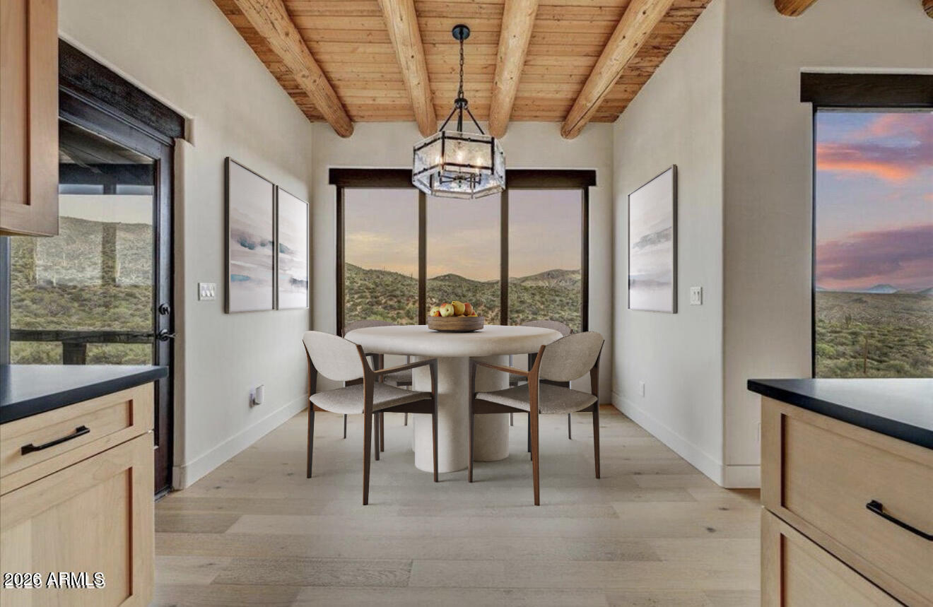 11702 East Blue Wash Road Scottsdale, AZ 85262 - Photo 21 of 50 a view of a dining room with furniture window and outside view