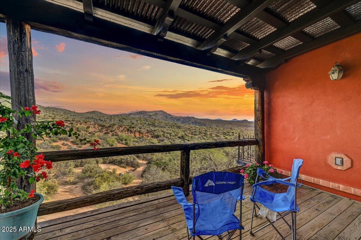 11702 East Blue Wash Road Scottsdale, AZ 85262 - Photo 36 of 50 a view of a chairs and table in the balcony