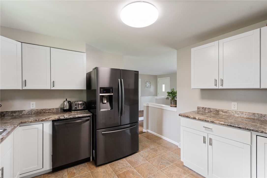 218 Kusak Road Henrietta, NY 14467 - Photo 33 of 33 Kitchen with view to front door.