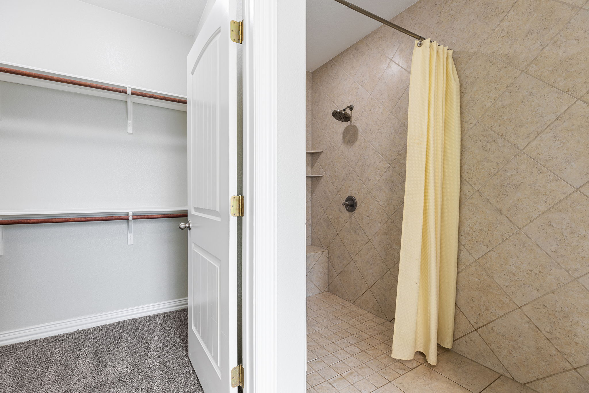 237 Cardinal Drive Paige, TX 78659 - Photo 16 of 37 Full bathroom featuring a spacious closet and a stall shower