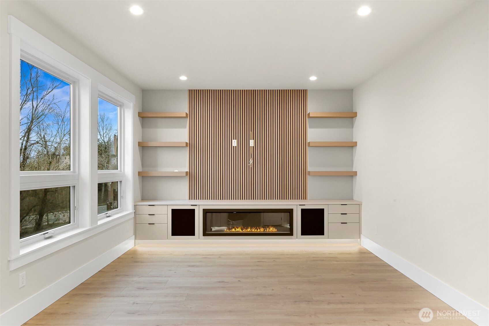 3713 Bristol Street Bellingham, WA 98226 - Photo 11 of 40 a view of an empty room with a fireplace and a window