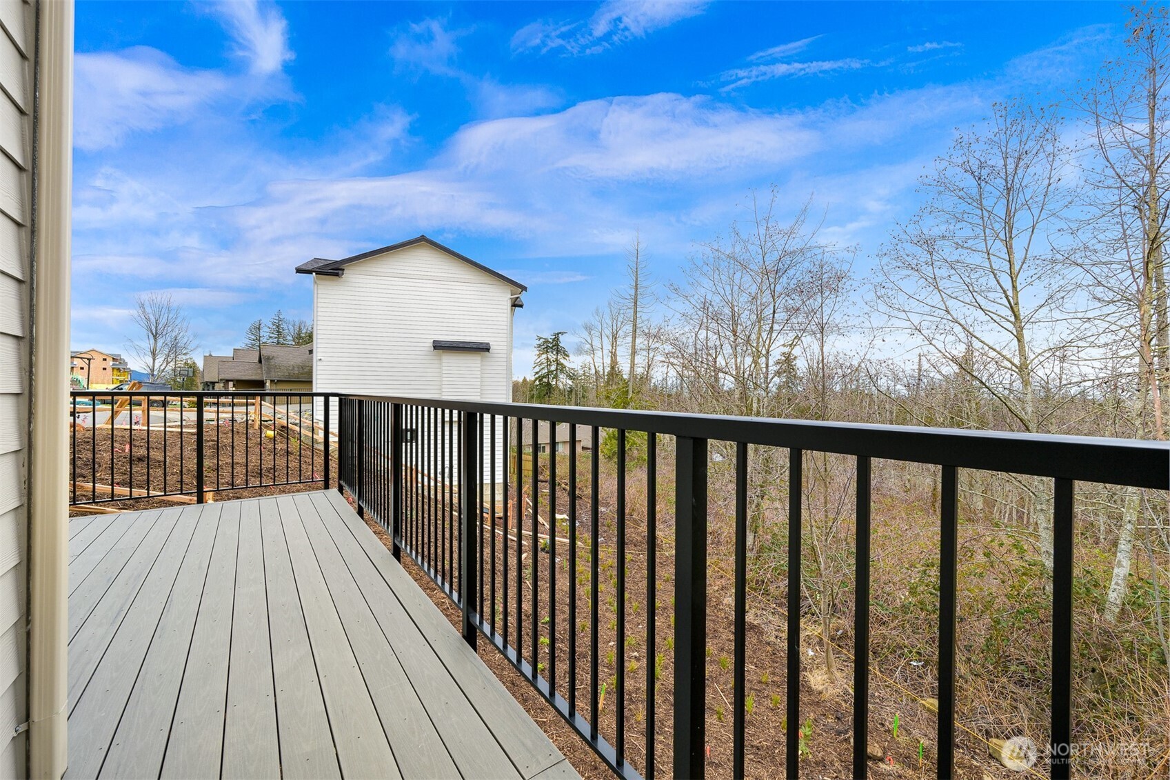 3713 Bristol Street Bellingham, WA 98226 - Photo 33 of 40 a balcony with wooden floor and fence
