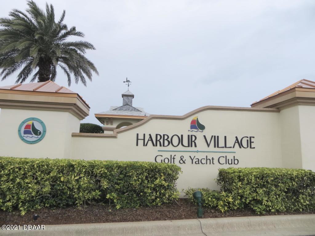 4625 Rivers Edge Village Lane, Unit 5201 Ponce Inlet, FL 32127 - Photo 2 of 18 Sign Harbour Vlg Yacht & Golf