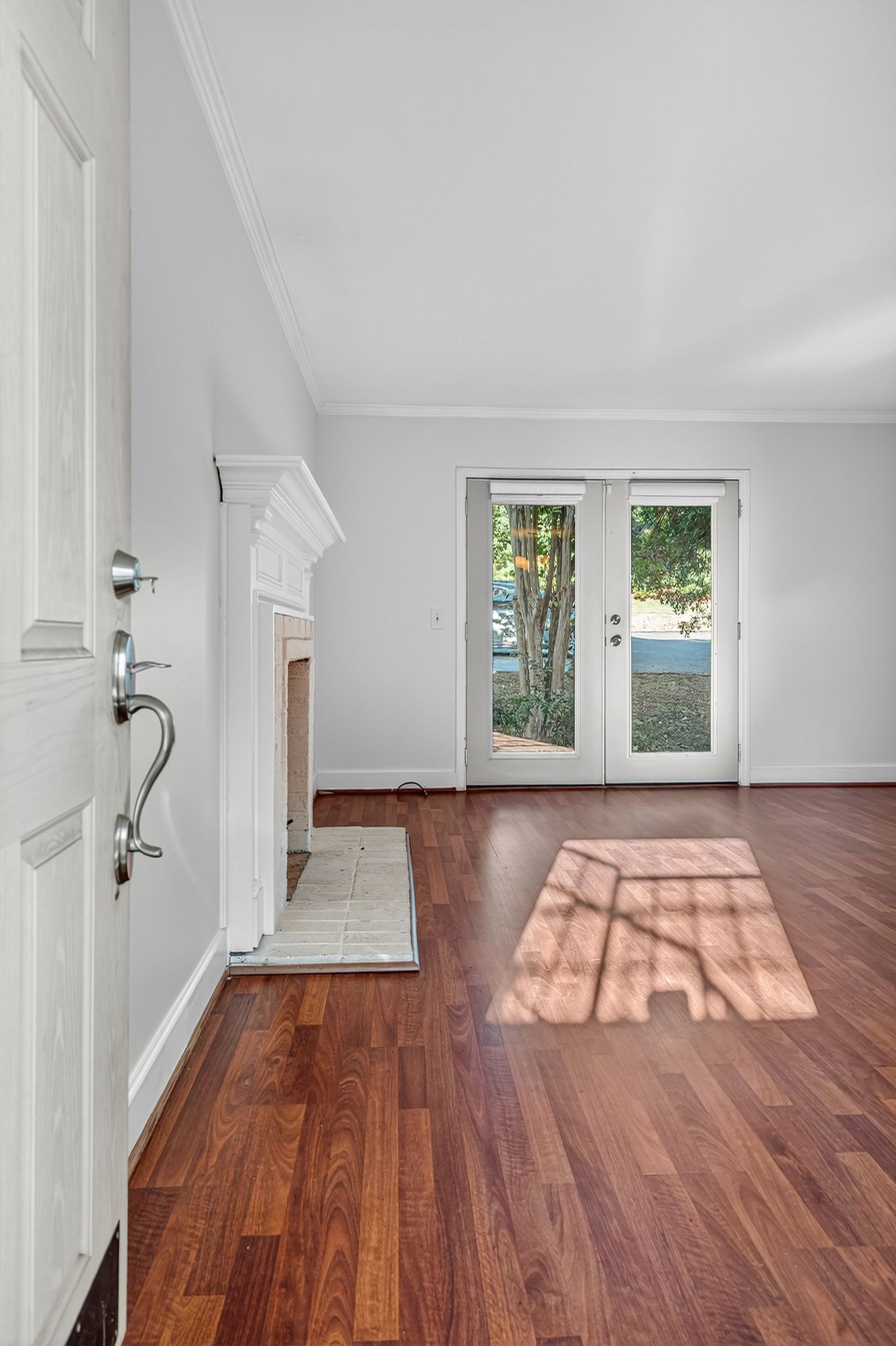 2116 Hobbs Road, Unit M16 Nashville, TN 37215 - Photo 4 of 24 wooden floor in an empty room with a window