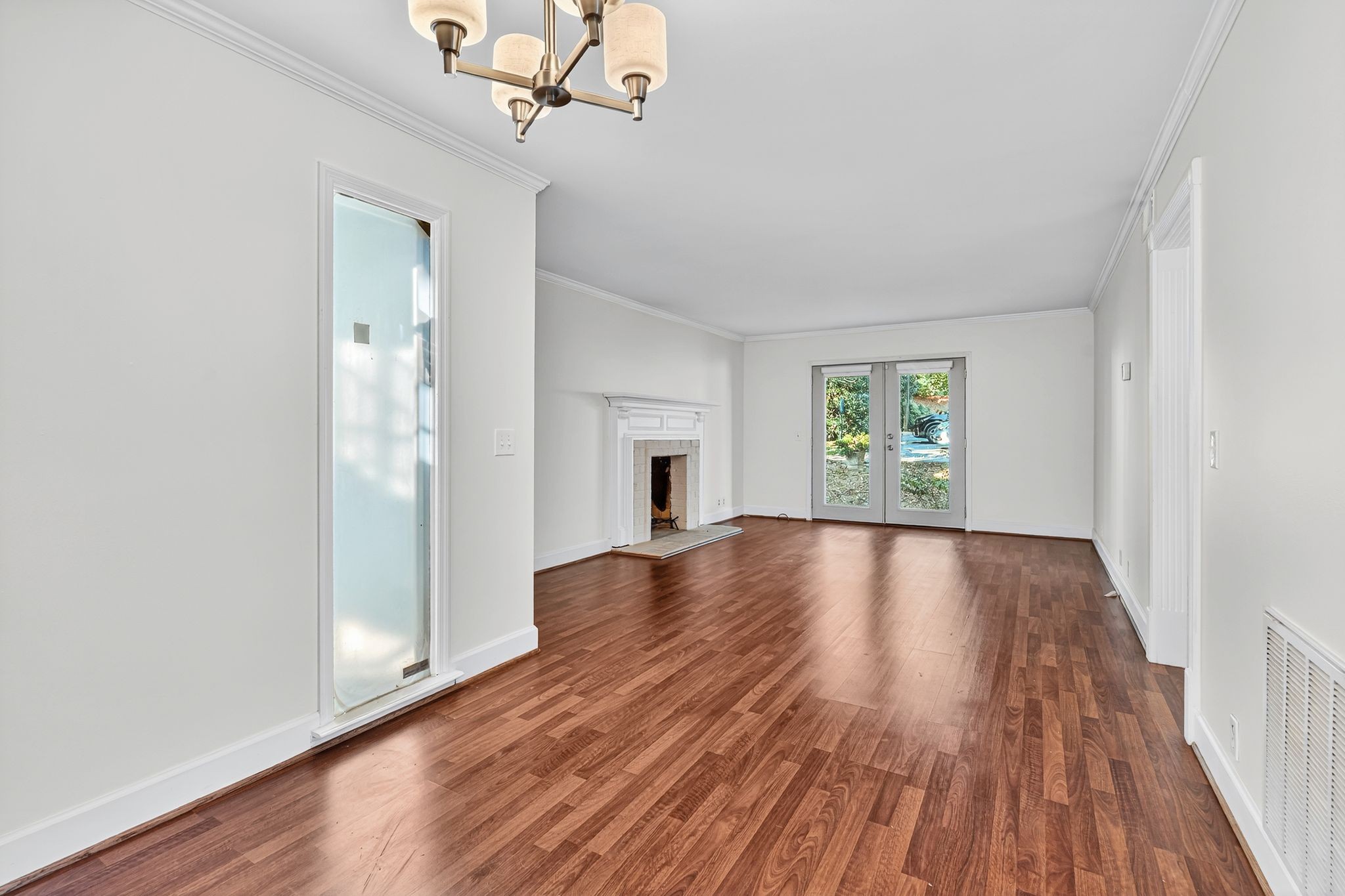 2116 Hobbs Road, Unit M16 Nashville, TN 37215 - Photo 8 of 24 a view of empty room with wooden floor and fan