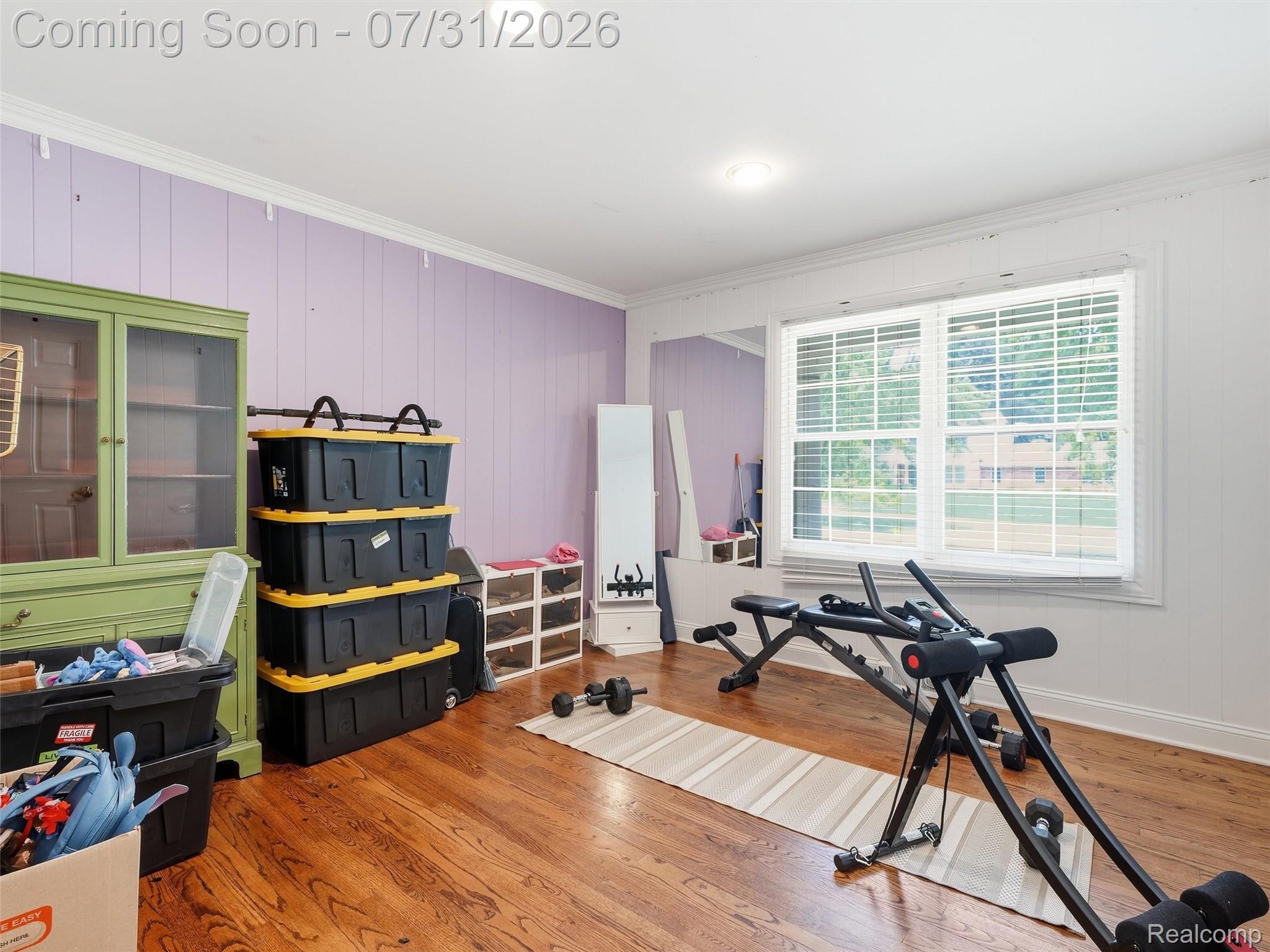 138 Aintree Road Rochester, MI 48306 - Photo 36 of 53 Spacious room featuring wood-finish flooring and a large window with blinds