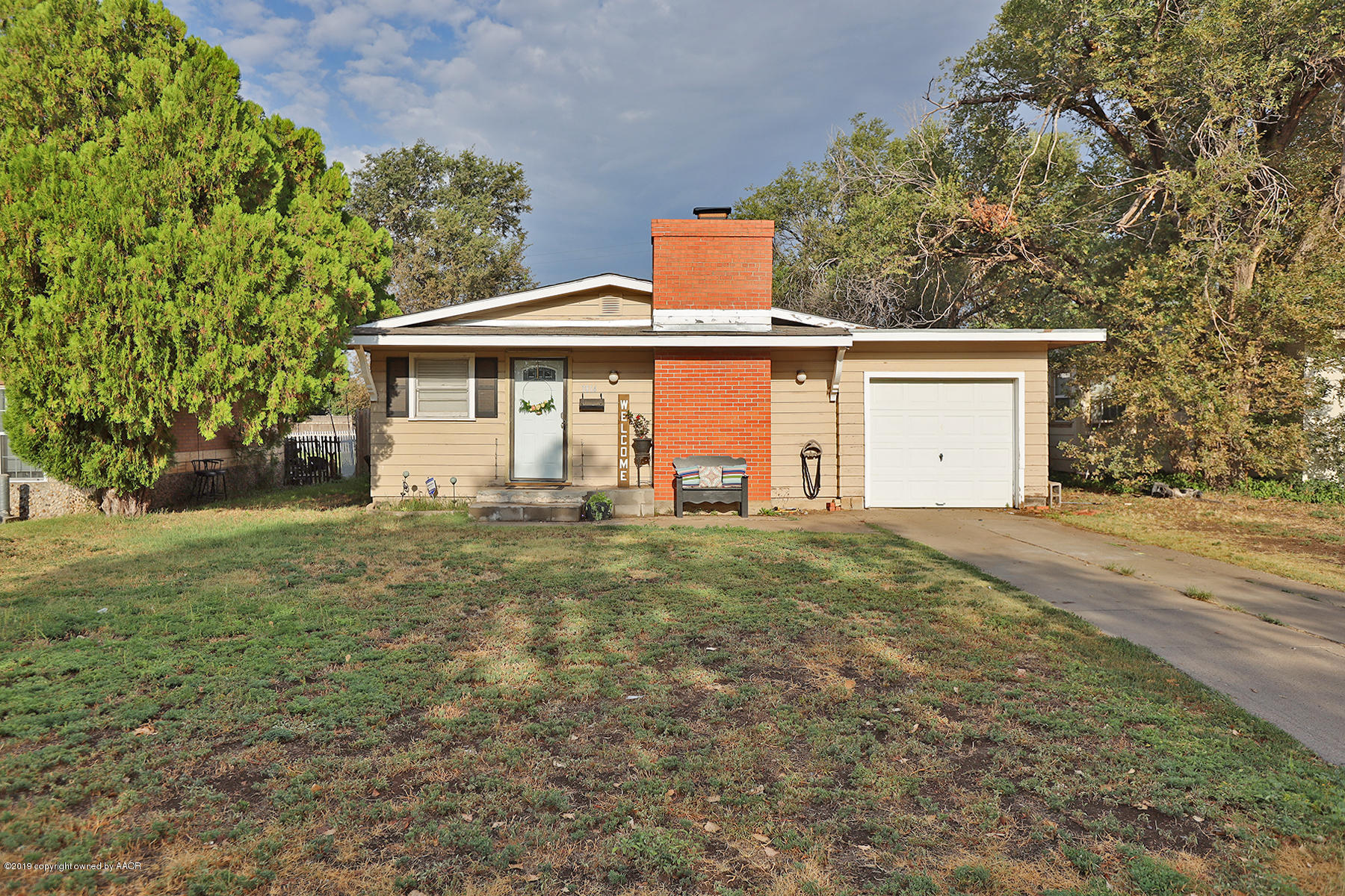 3814 South Monroe Street Amarillo, TX 79110 - Photo 1 of 22 front view of house with a yard