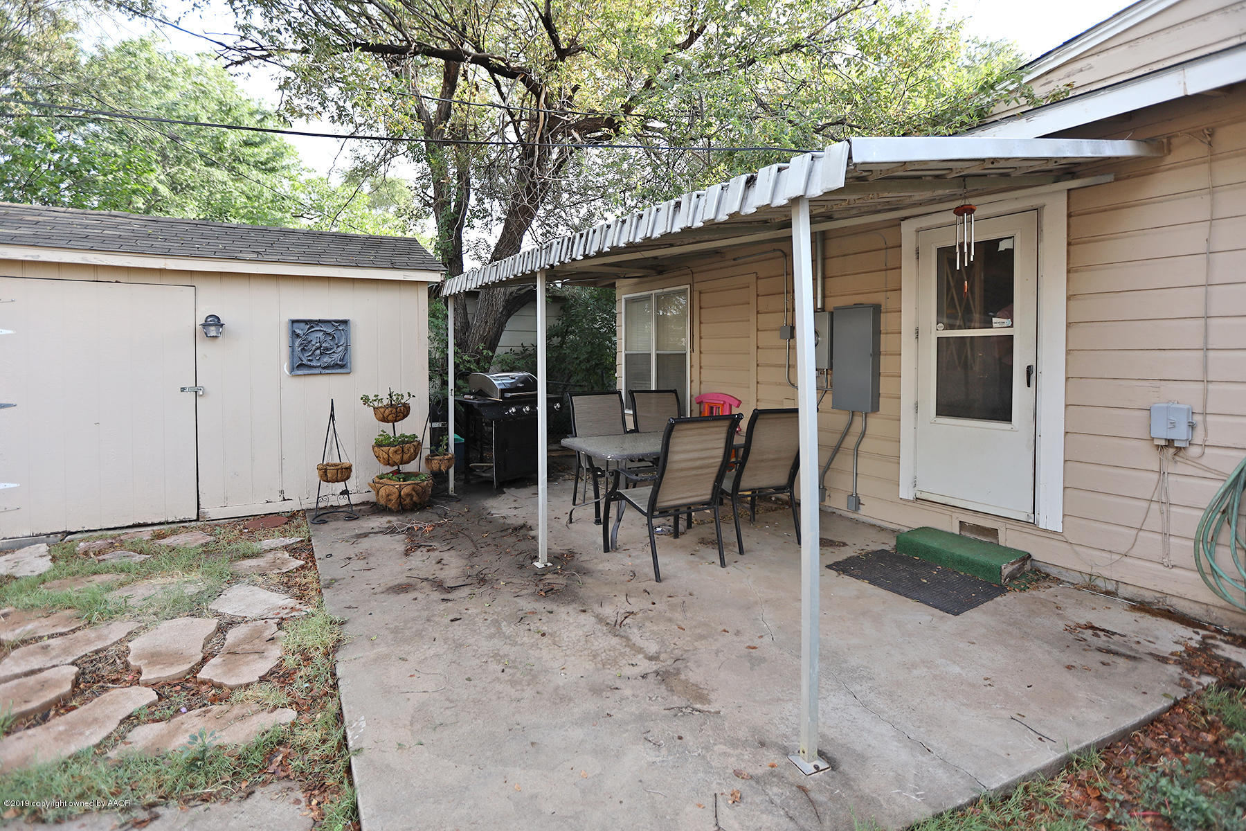 3814 South Monroe Street Amarillo, TX 79110 - Photo 17 of 22 a view of a outdoor space with a patio and backyard