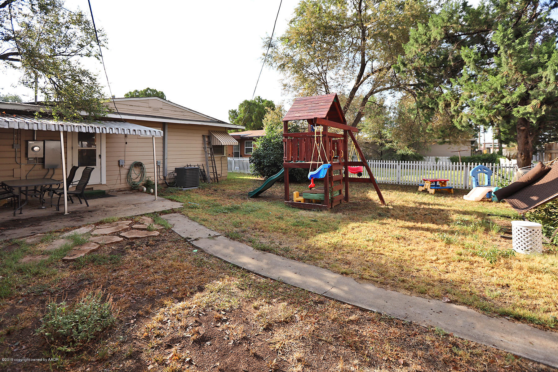 3814 South Monroe Street Amarillo, TX 79110 - Photo 18 of 22 a view of a park with slide