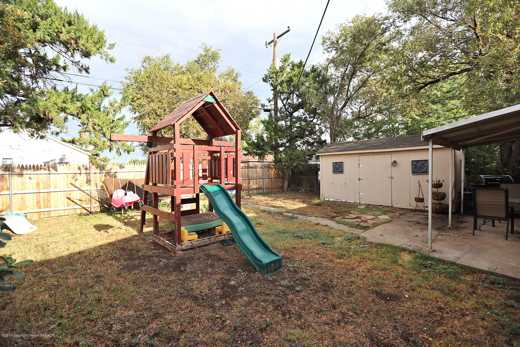 3814 South Monroe Street Amarillo, TX 79110 - Photo 19 of 22 a house with trees in the background
