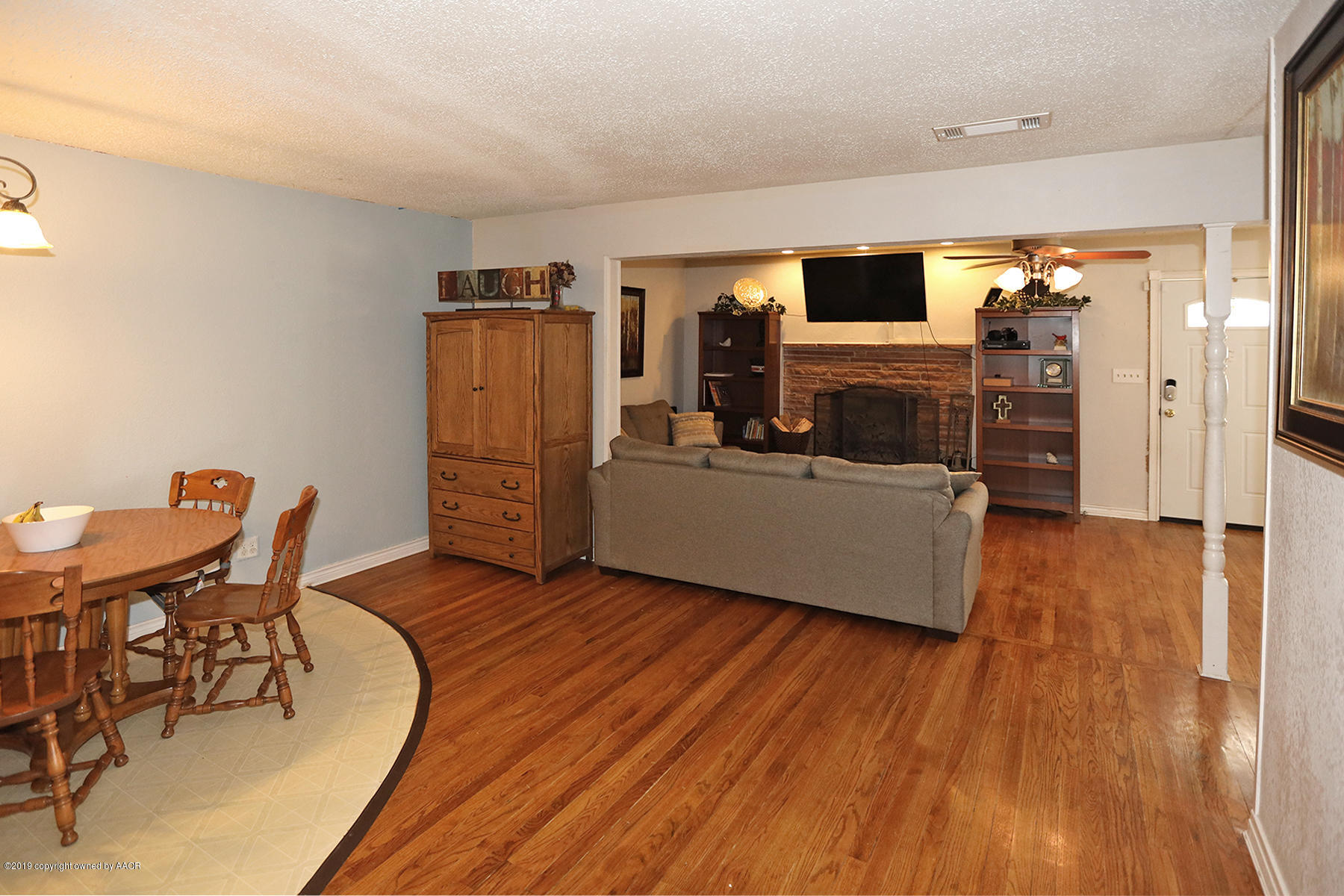 3814 South Monroe Street Amarillo, TX 79110 - Photo 22 of 22 a living room with furniture and a flat screen tv