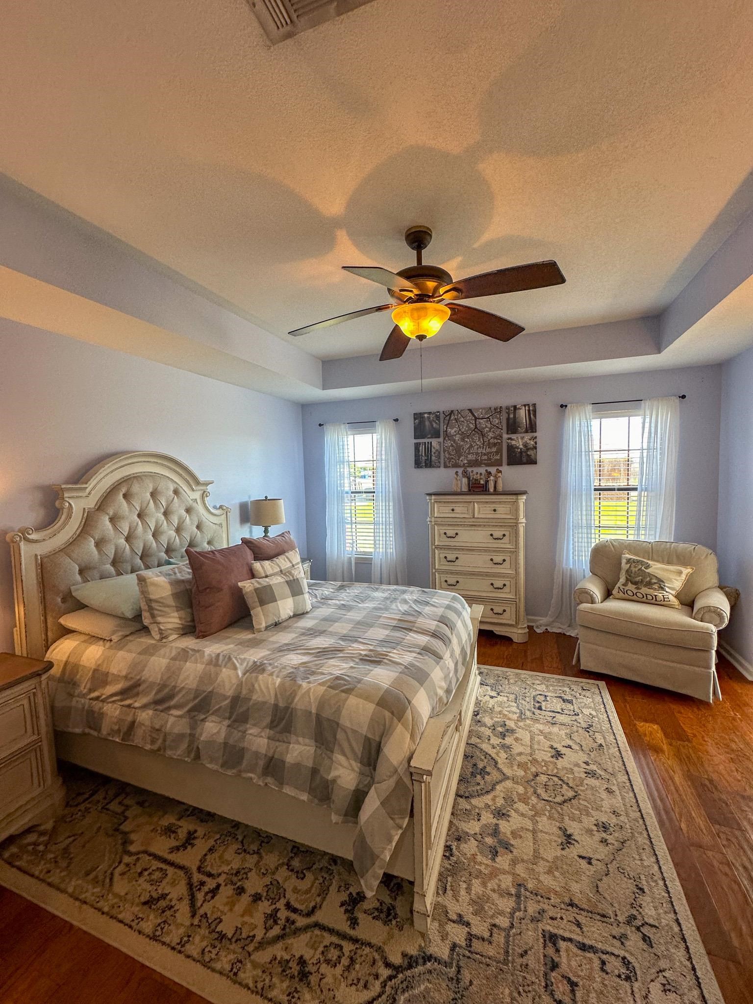 2 Raptor Drive Belmont, MS 38827 - Photo 8 of 18 Bedroom with a raised ceiling, a textured ceiling, ceiling fan, and hardwood / wood-style floors