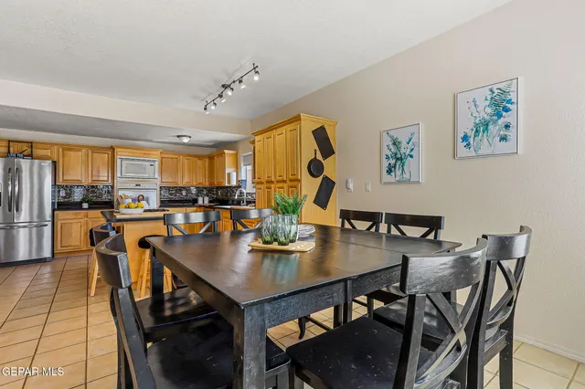 a bedroom with bed and a dresser