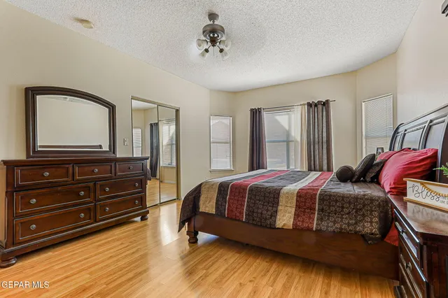 a kitchen with stainless steel appliances granite countertop a refrigerator a stove a sink and dishwasher