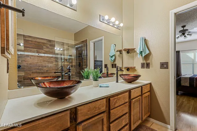 a view of an empty room with windows