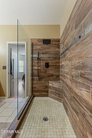 a work room with furniture and a window