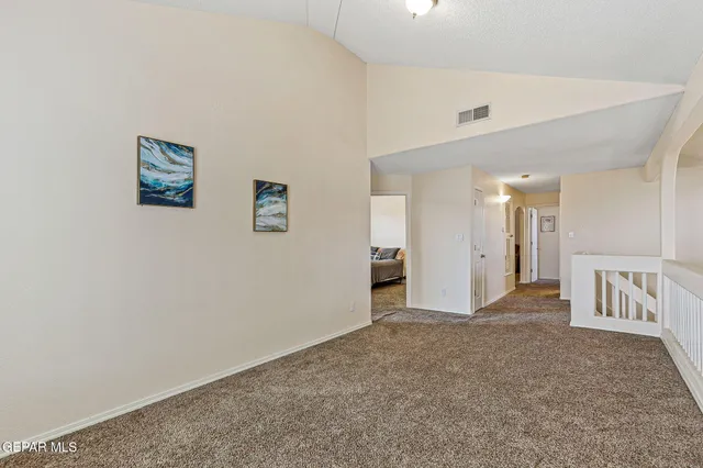 a bathroom with a granite countertop sink toilet a large mirror a shower and a bathtub