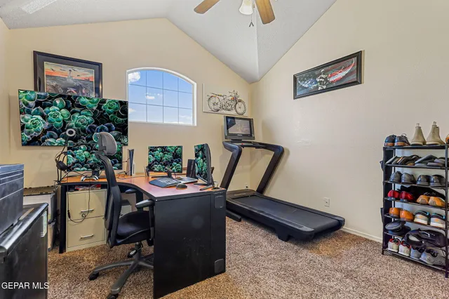 a view of a house with a swimming pool and a yard