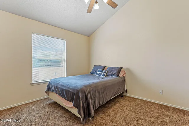 a view of a swimming pool with an outdoor seating