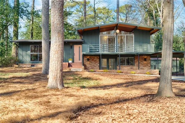 a front view of a house with a porch