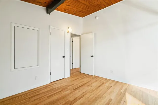 a bathroom with a sink toilet and mirror