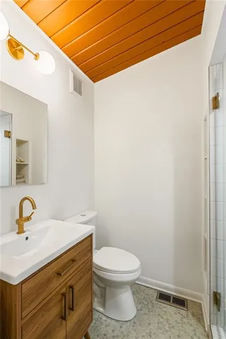 a dining room with furniture and a window