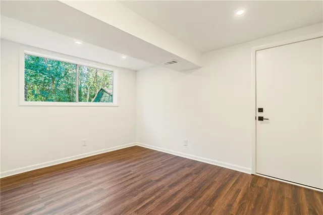 a view of a entrance gate of the house and tree