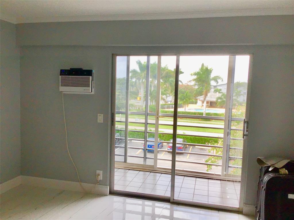 35 Suffolk Way, Unit 35 Boca Raton, FL 33434 - Photo 11 of 20 a view of a room with a large window