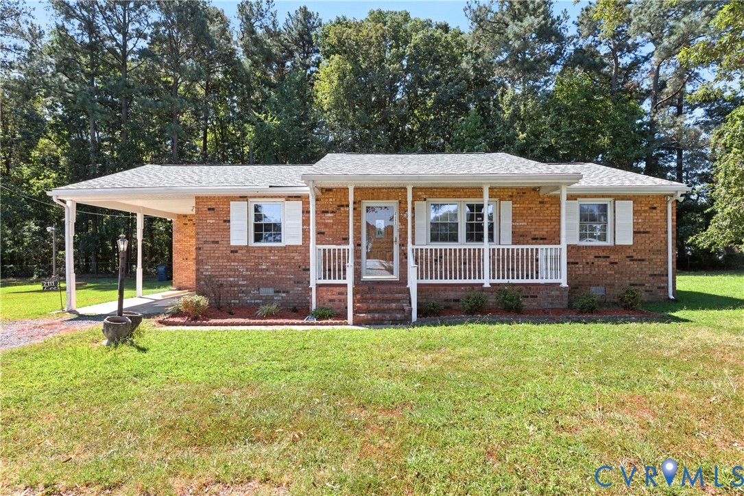 2111 Clary Road Petersburg, VA 23805 - Photo 1 of 47 a view of a house with a yard and sitting area