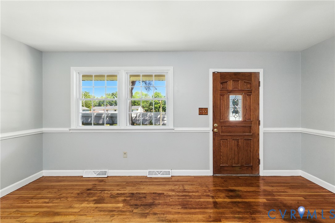 2111 Clary Road Petersburg, VA 23805 - Photo 11 of 47 a view of wooden floor and cabinet in a room