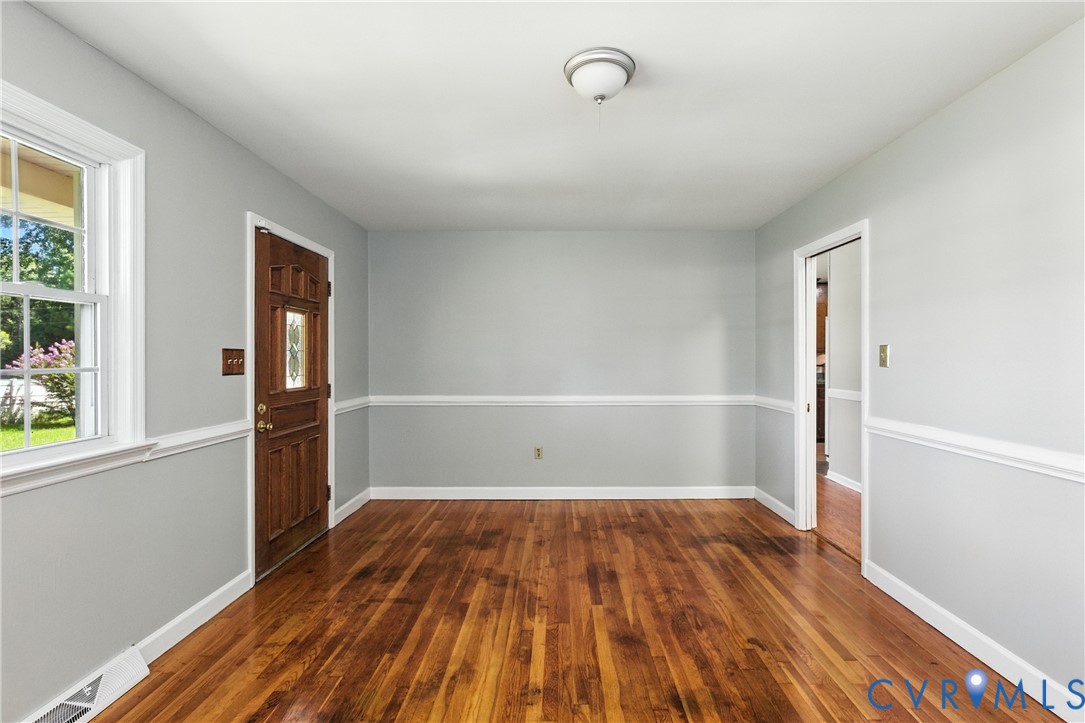 2111 Clary Road Petersburg, VA 23805 - Photo 12 of 47 a view of a room with wooden floor and white walls