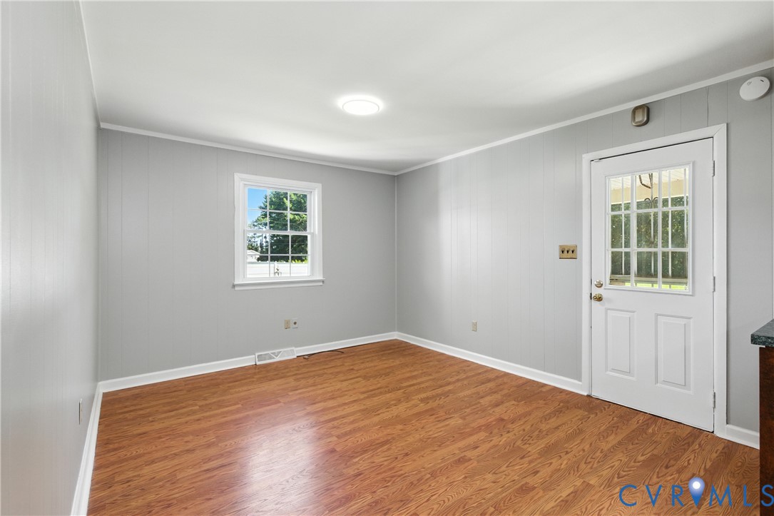 2111 Clary Road Petersburg, VA 23805 - Photo 13 of 47 a view of empty room with wooden floor and fan