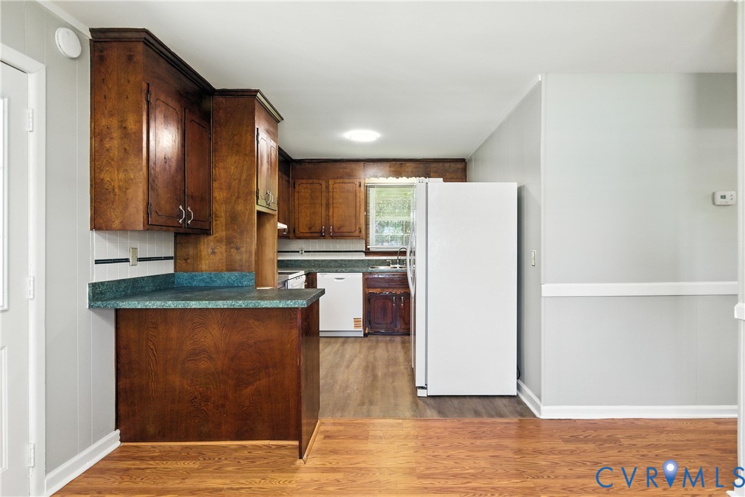 2111 Clary Road Petersburg, VA 23805 - Photo 17 of 47 a view of a kitchen with wooden floor