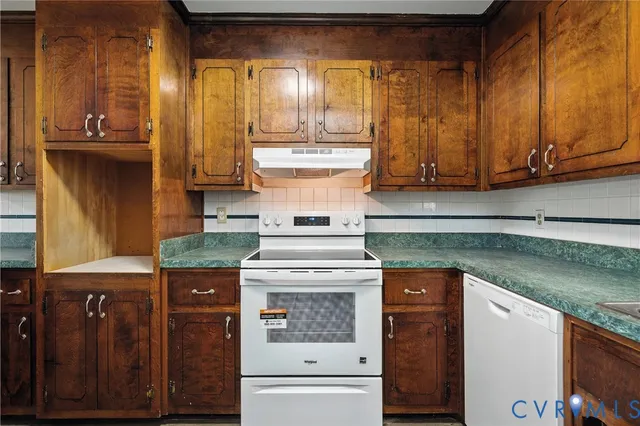 a kitchen with a stove and a cabinet