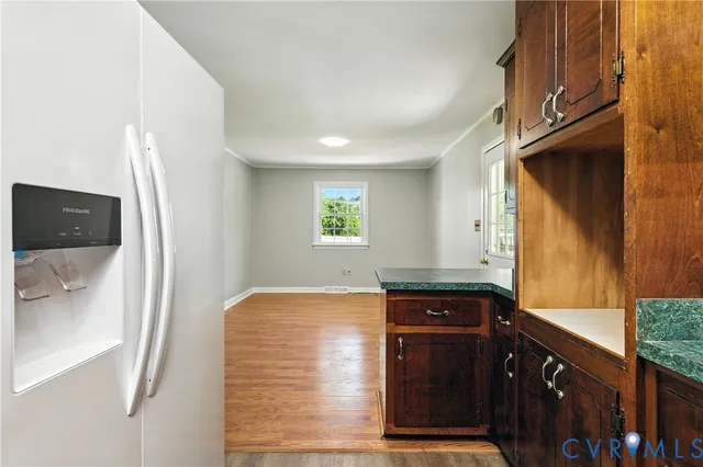 a kitchen with a sink and a stove