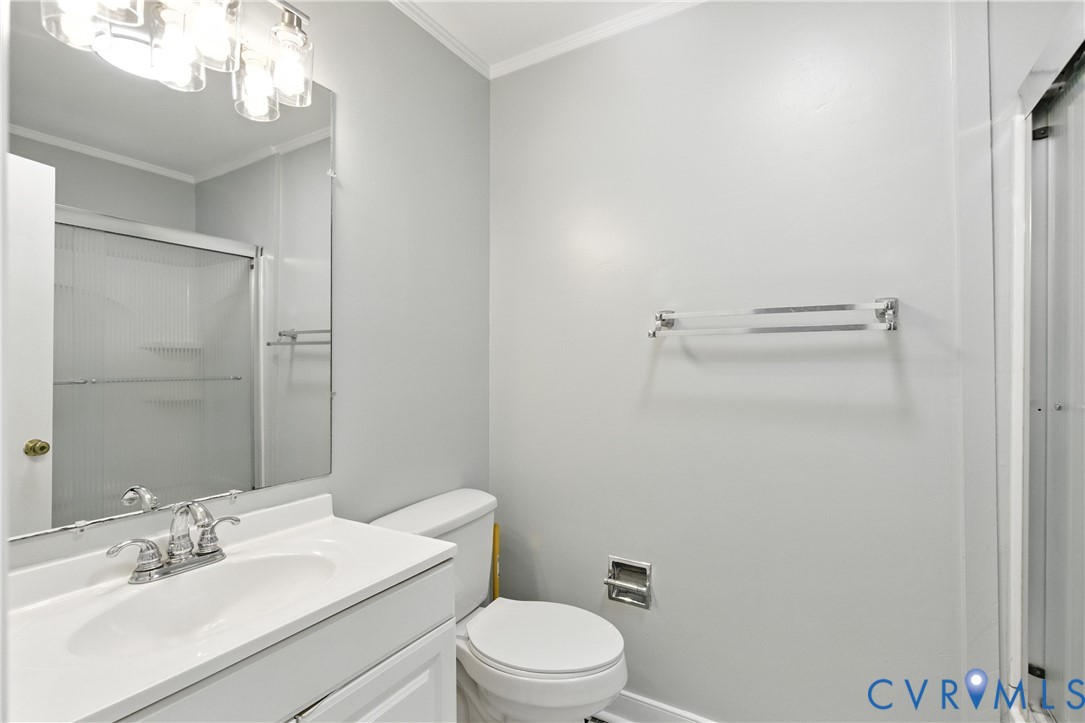 2111 Clary Road Petersburg, VA 23805 - Photo 28 of 47 a bathroom with a sink a toilet and shower