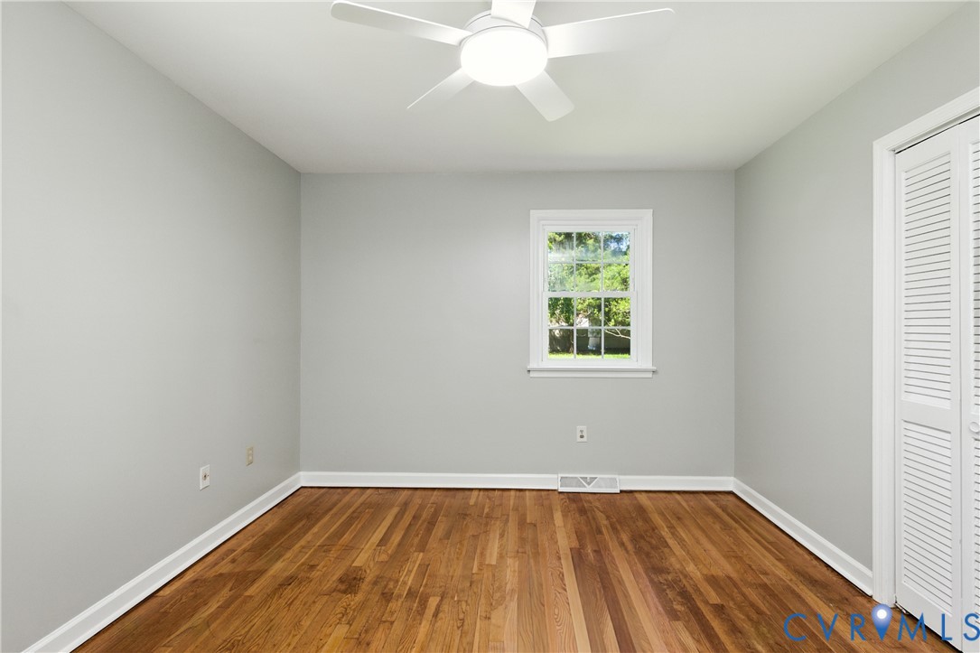 2111 Clary Road Petersburg, VA 23805 - Photo 35 of 47 wooden floor in an empty room with a window