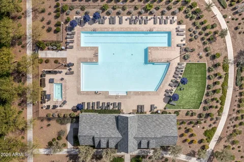 an aerial view of houses with outdoor space