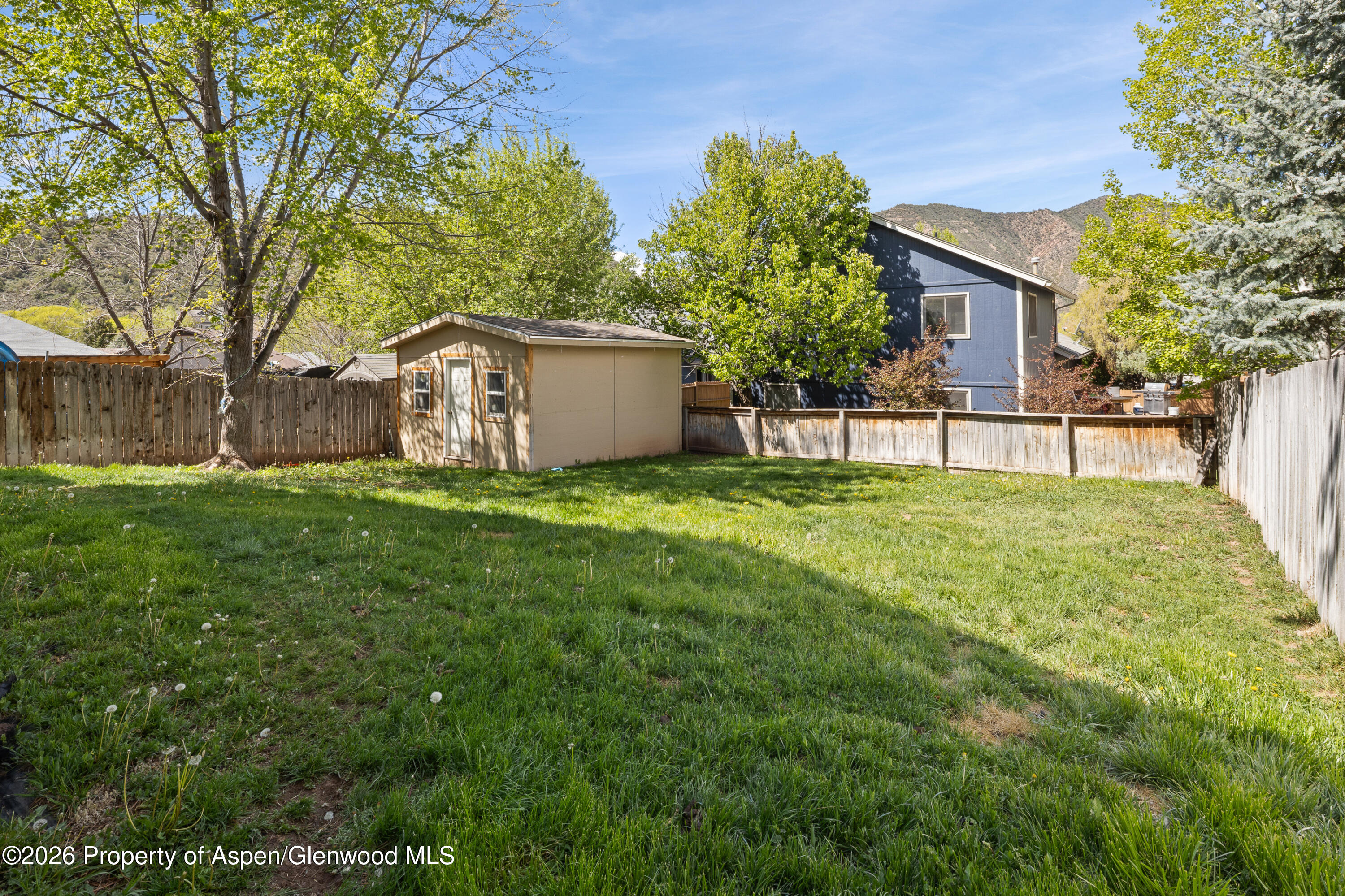 164 Current Drive New Castle, CO 81647 - Photo 34 of 34 a view of a house with a yard