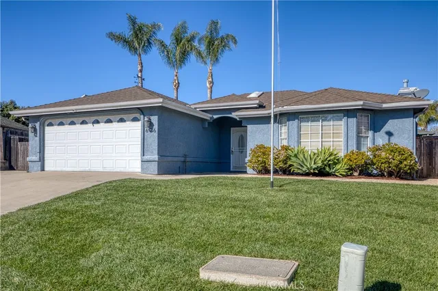 a house view with a garden space